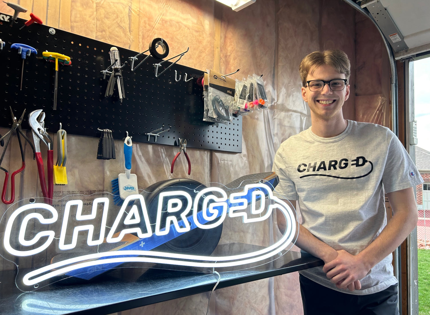 Charged Canada Standing in Garage